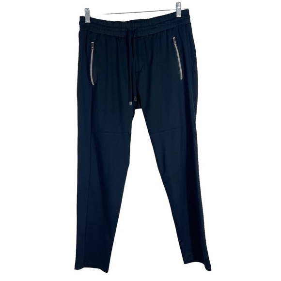 Athleta Pants - ATHLETA Black Pull Pants  tapered leg elastic waist zipper pockets size medium